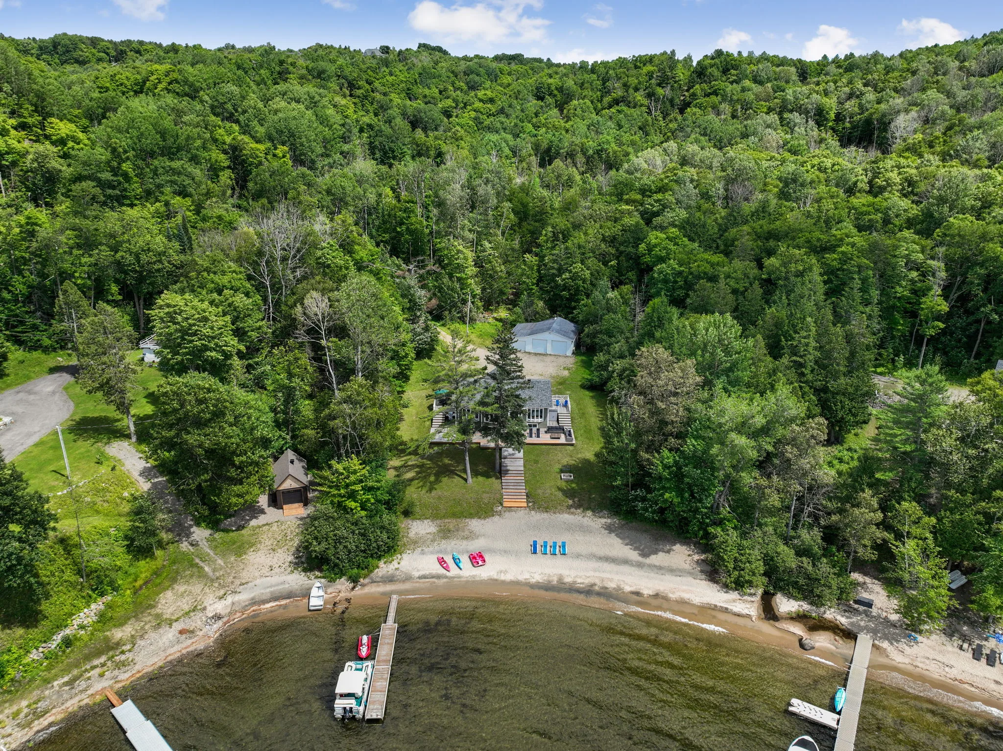 Aerial view of the chalet with private beach — Chalet Beach House — Lac-Simon, Laurentians