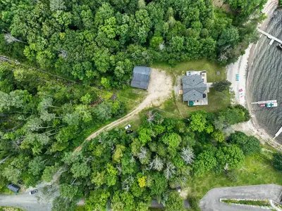 Chalet roofline from overhead with large terrace — Chalet Beach House — Lac-Simon, Laurentians